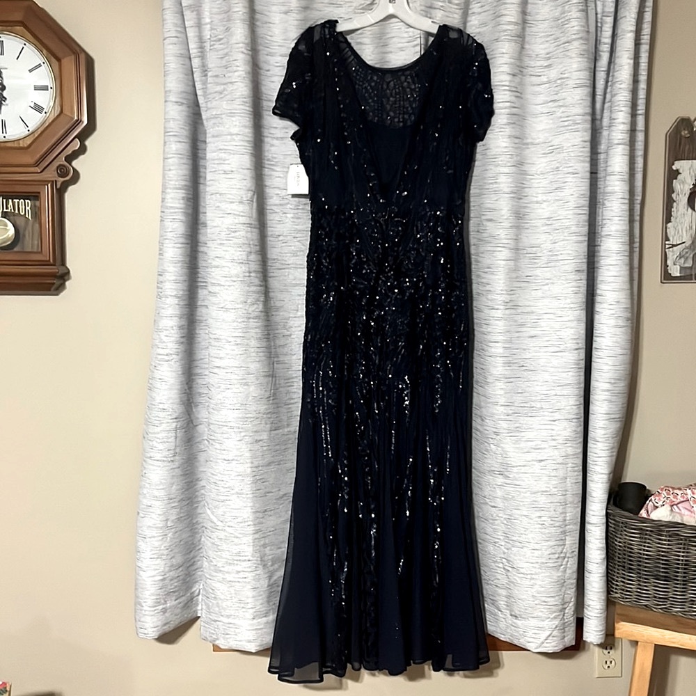Brand new with tags floor length navy prom dress.